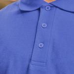 close-up of blue uniform polo shirt